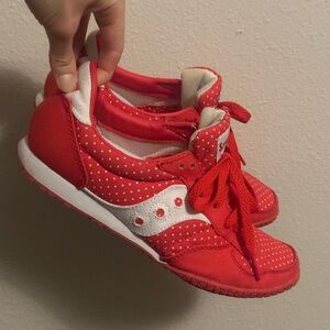 Saucony red tennis shoes / trainers